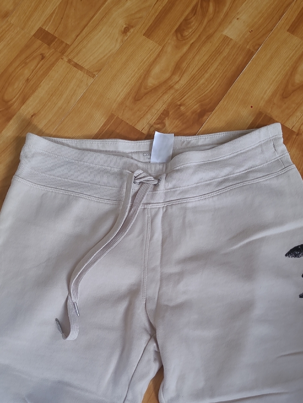 Calvin Klein Performance Cream Joggers with Black Logo Accent - Picture 2 of 5